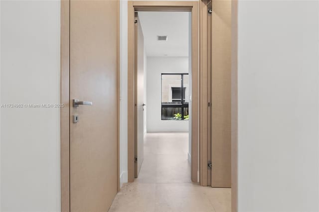 hallway featuring visible vents