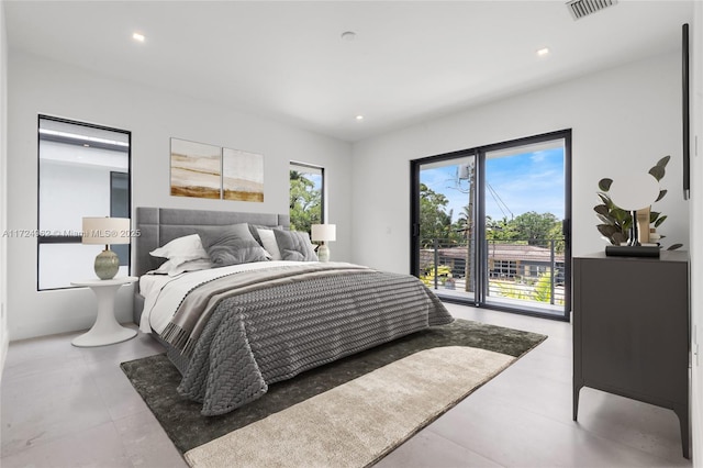 bedroom with recessed lighting, visible vents, and access to outside