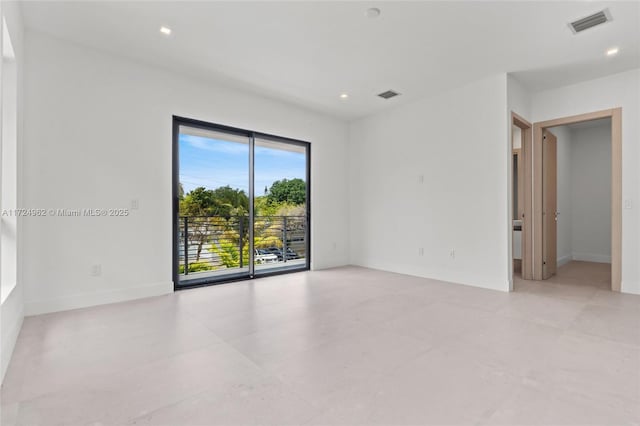 spare room featuring recessed lighting, visible vents, and baseboards