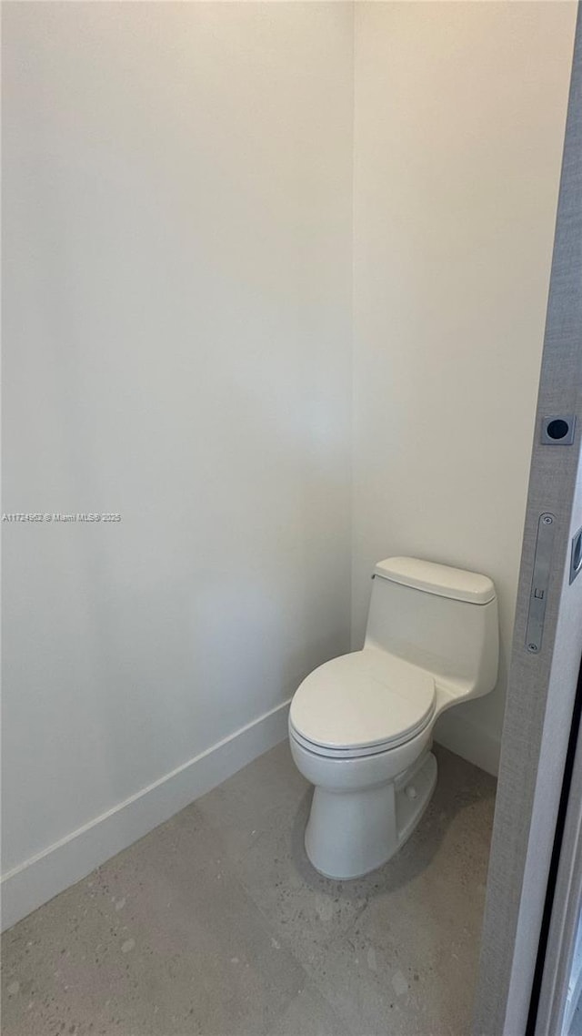 bathroom featuring toilet