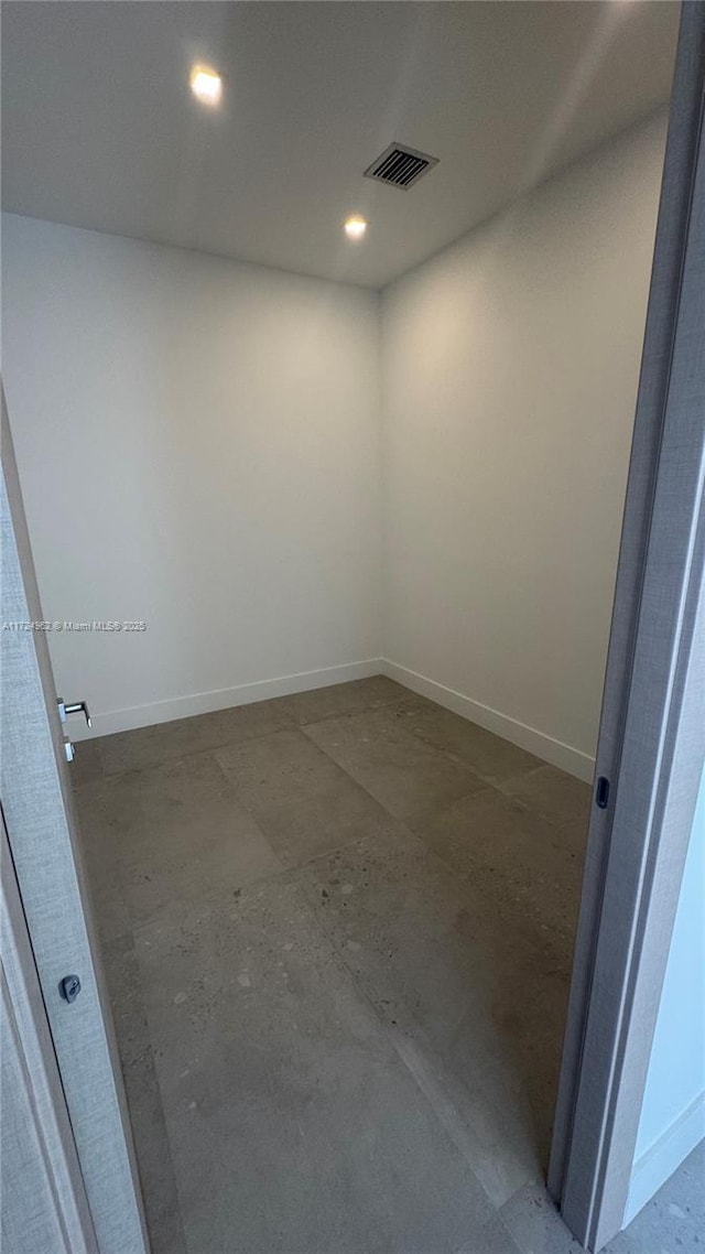 empty room with concrete floors