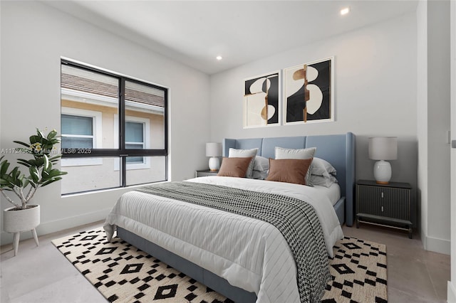 bedroom featuring baseboards and recessed lighting