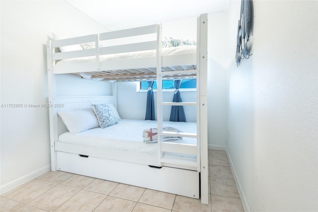 bedroom featuring light tile patterned floors