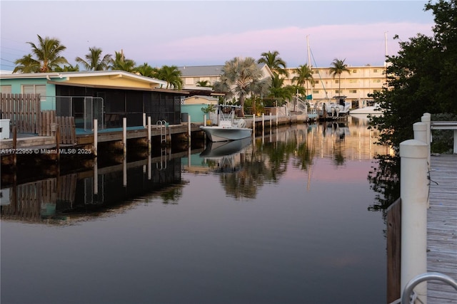 dock area with a water view