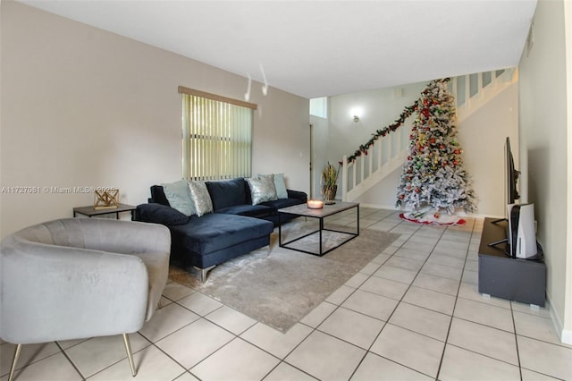 living room featuring light tile patterned flooring