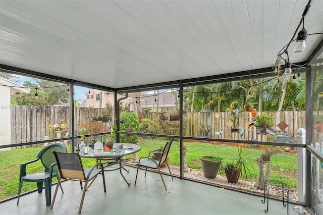 sunroom / solarium with a healthy amount of sunlight