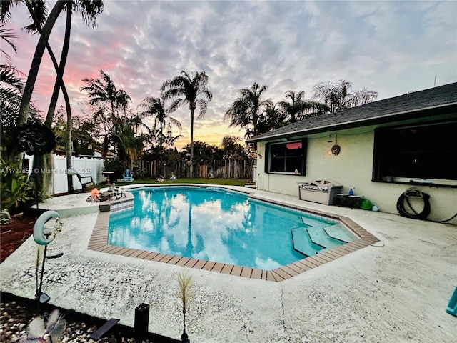 view of swimming pool featuring a patio area