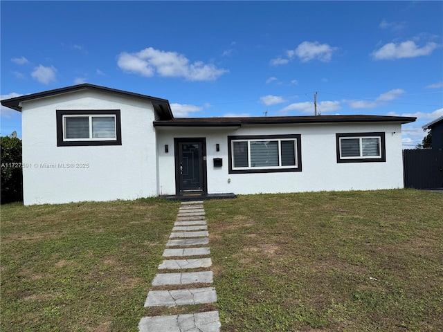 view of front of home with a front yard