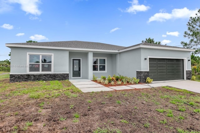 single story home featuring a garage