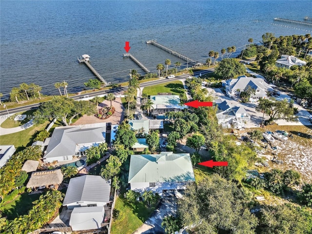 birds eye view of property featuring a water view