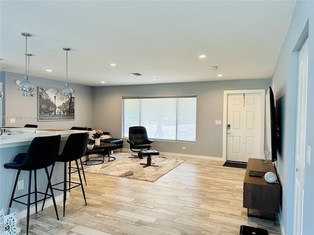 living room with light wood-type flooring