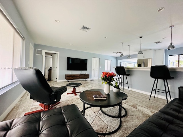 living room with light wood-type flooring