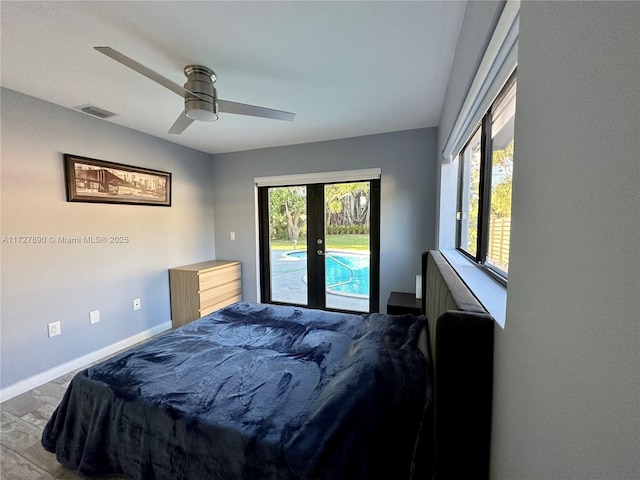 bedroom with access to outside, french doors, and ceiling fan