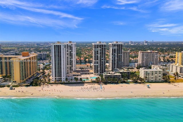 aerial view with a beach view and a water view