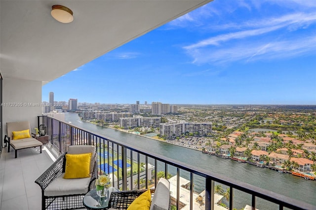 balcony featuring a water view