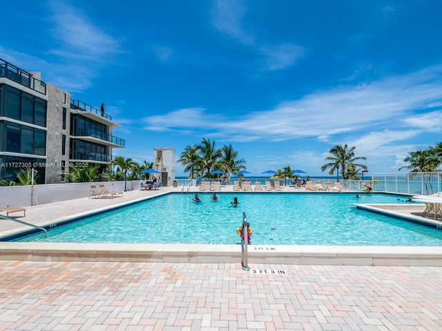 view of pool featuring a patio