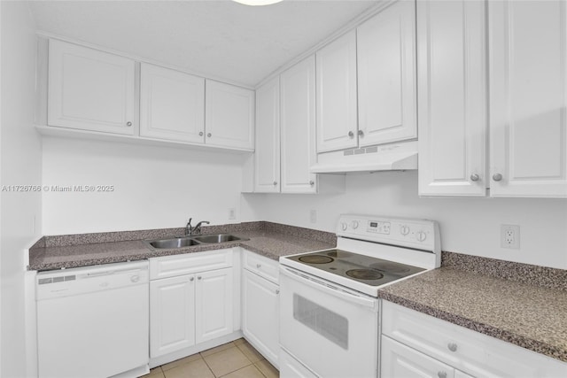 kitchen featuring sink, white appliances, white cabinetry, and light tile patterned flooring