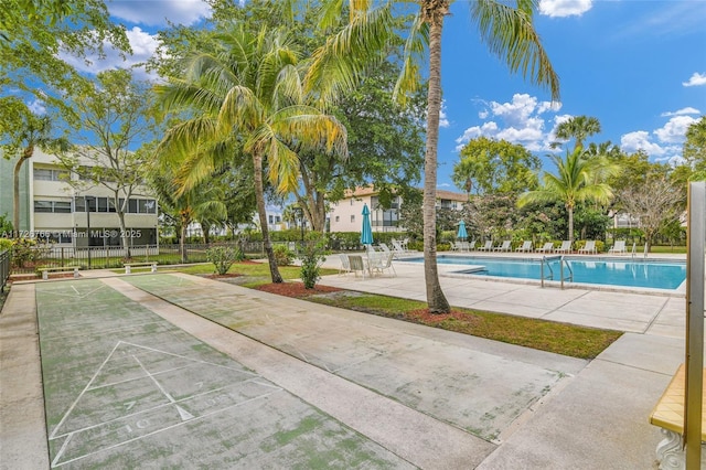 view of pool featuring a patio