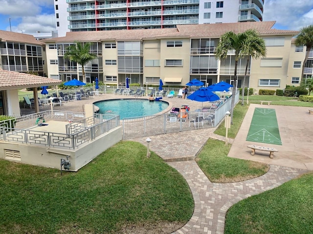 view of pool featuring a patio area