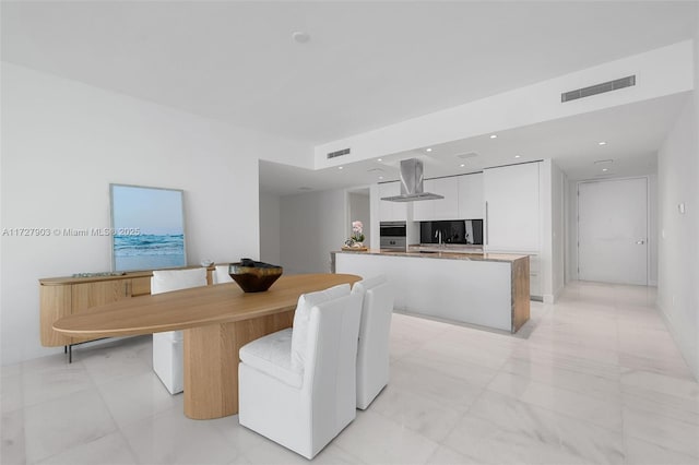 dining space featuring sink