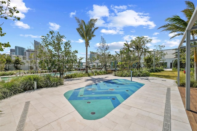 view of swimming pool featuring a patio