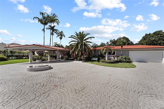 view of front of property with a garage