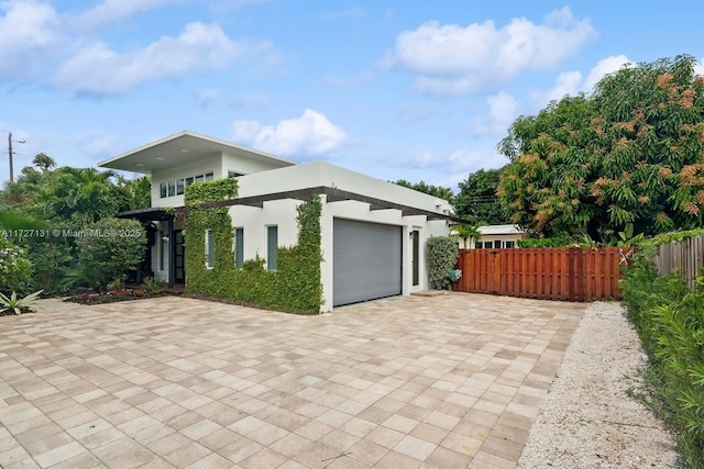 view of patio / terrace featuring a garage