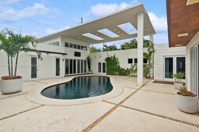 pool with a patio