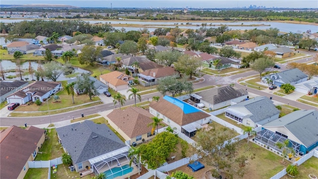 bird's eye view with a water view