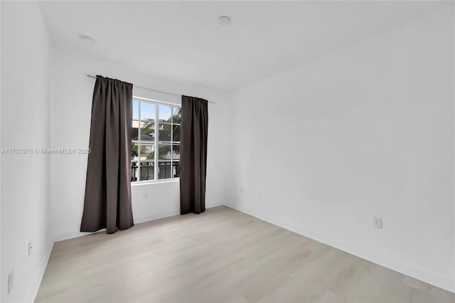 empty room featuring light hardwood / wood-style floors