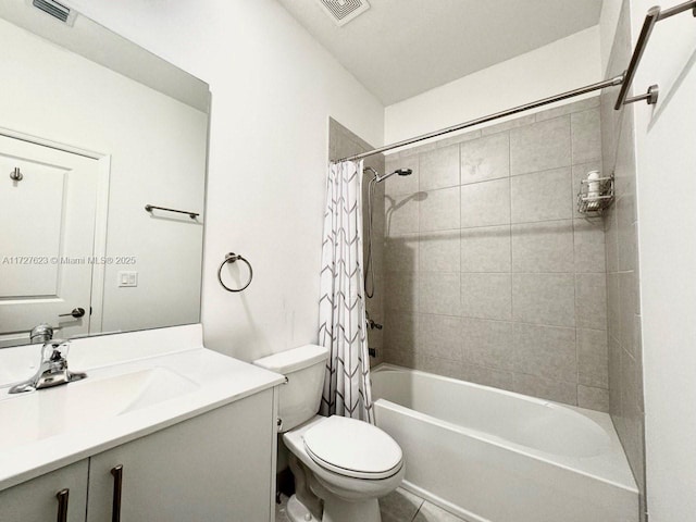 full bathroom with shower / bath combo, toilet, and vanity