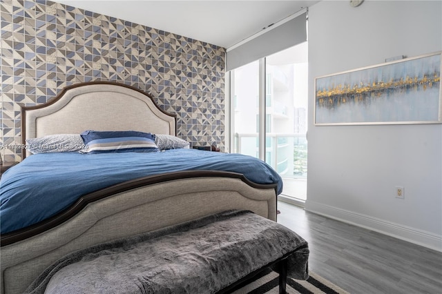 bedroom featuring wood-type flooring