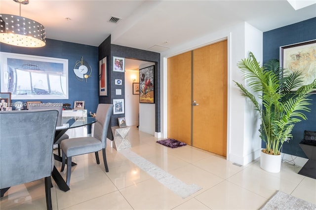 dining space with light tile patterned floors