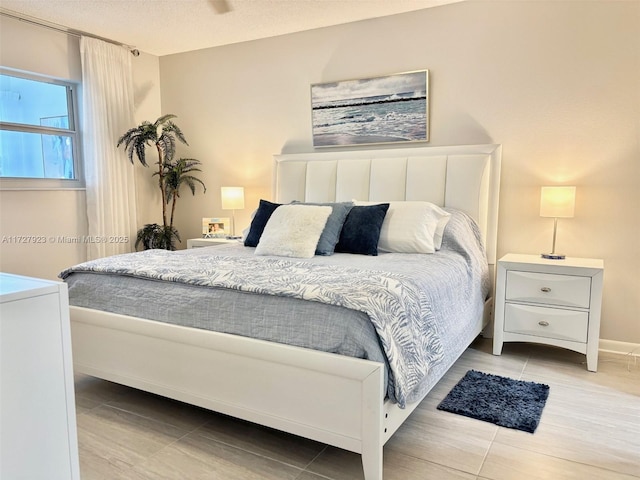 bedroom featuring a textured ceiling