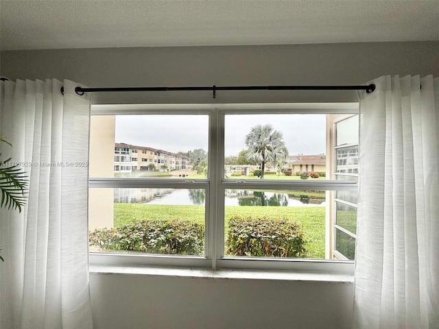 entryway featuring a water view