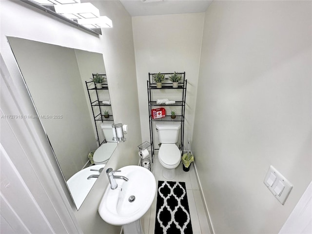 bathroom with toilet and sink