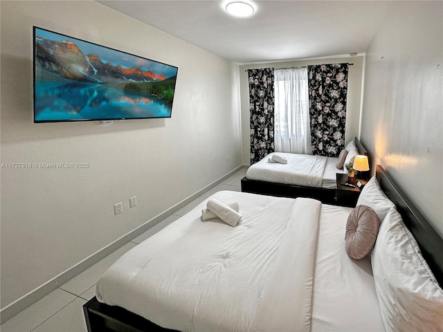 bedroom featuring tile patterned floors