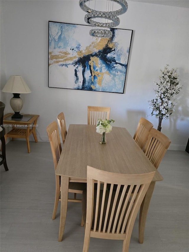 dining area featuring a chandelier