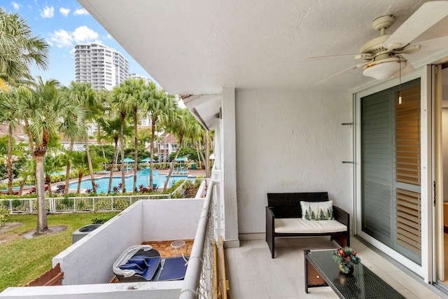 balcony featuring ceiling fan and central AC unit