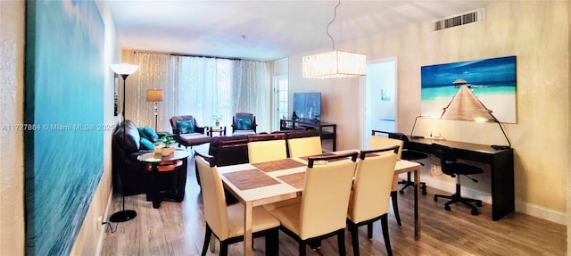 dining room featuring hardwood / wood-style floors