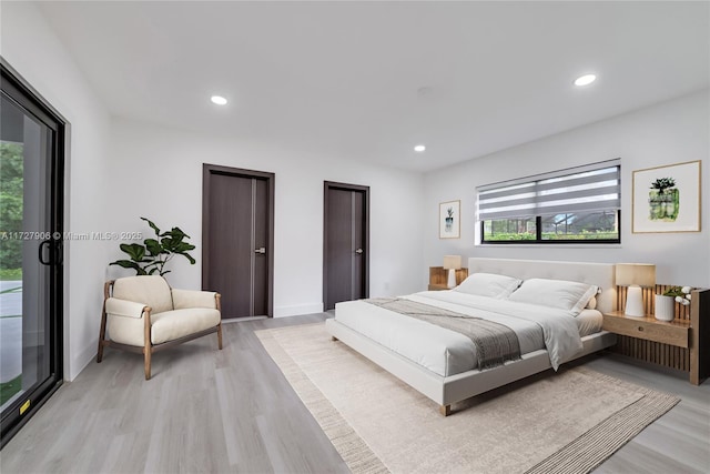 bedroom featuring light hardwood / wood-style floors