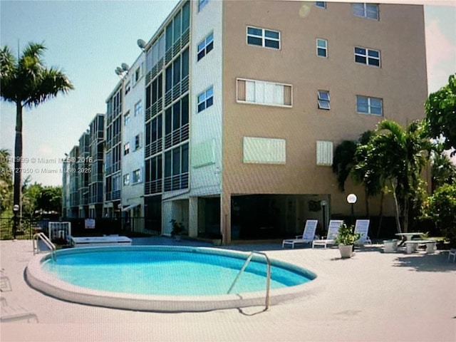 view of pool with a patio