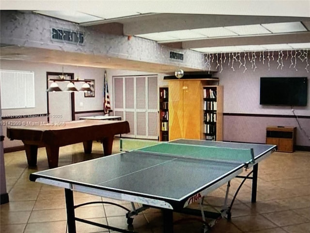 game room featuring beam ceiling, tile patterned floors, and billiards