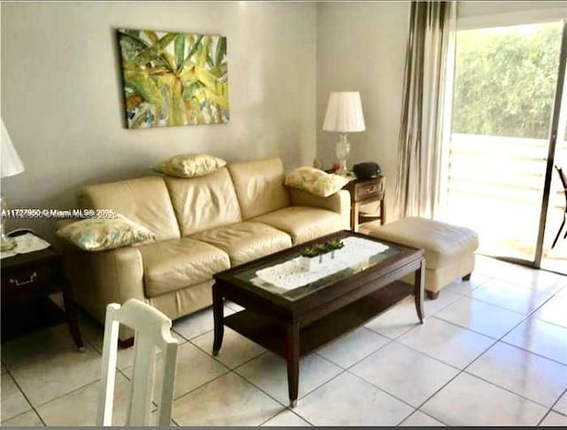 living room featuring light tile patterned floors