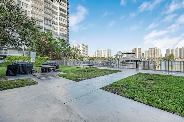 view of home's community with a lawn