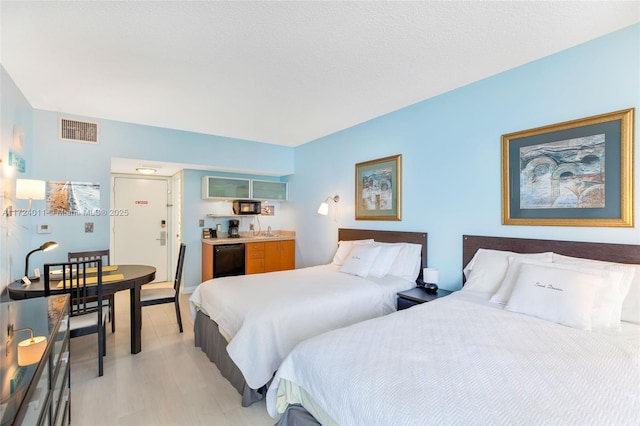 bedroom with light wood-type flooring