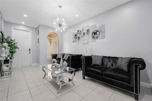 tiled living room featuring a chandelier