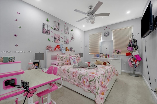 bedroom featuring ceiling fan and light colored carpet