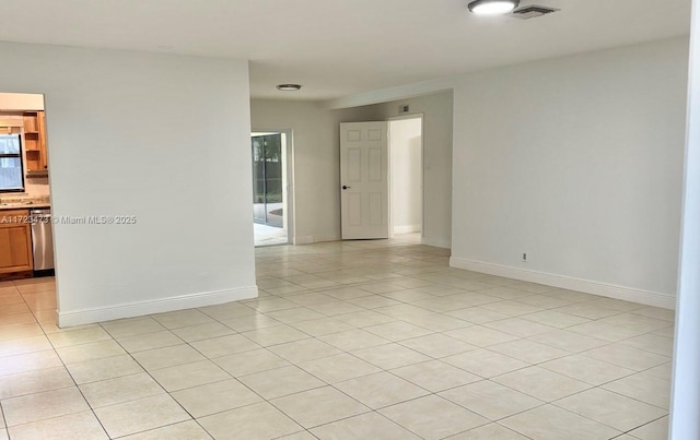 view of tiled spare room