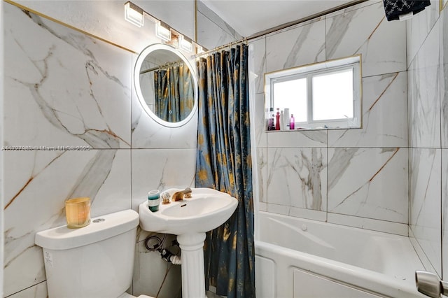 bathroom with toilet and shower / bath combo with shower curtain